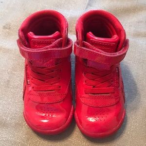 Baby red Reebok sneakers